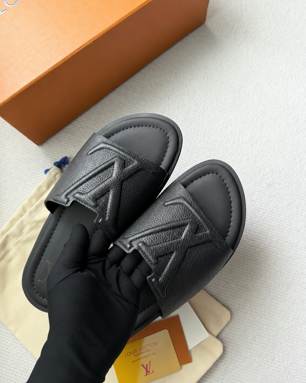 Louis Vuitton LV Embossed Leather Slide Sandals