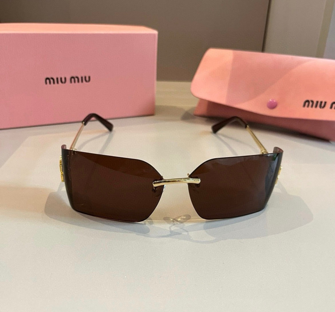 Miu Miu SMUA54 Brown Rimless Oval Sunglasses
