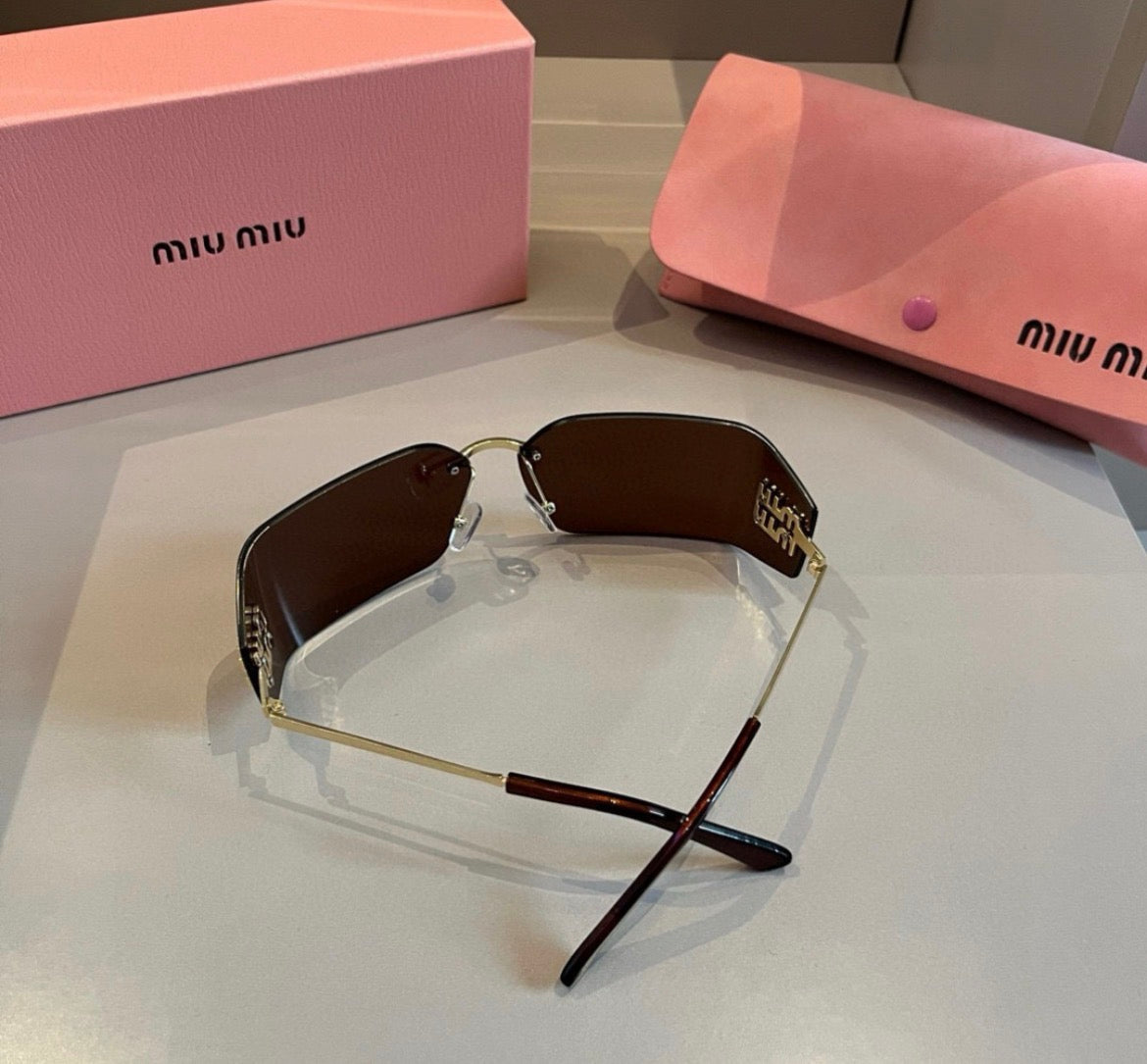 Miu Miu SMUA54 Brown Rimless Oval Sunglasses