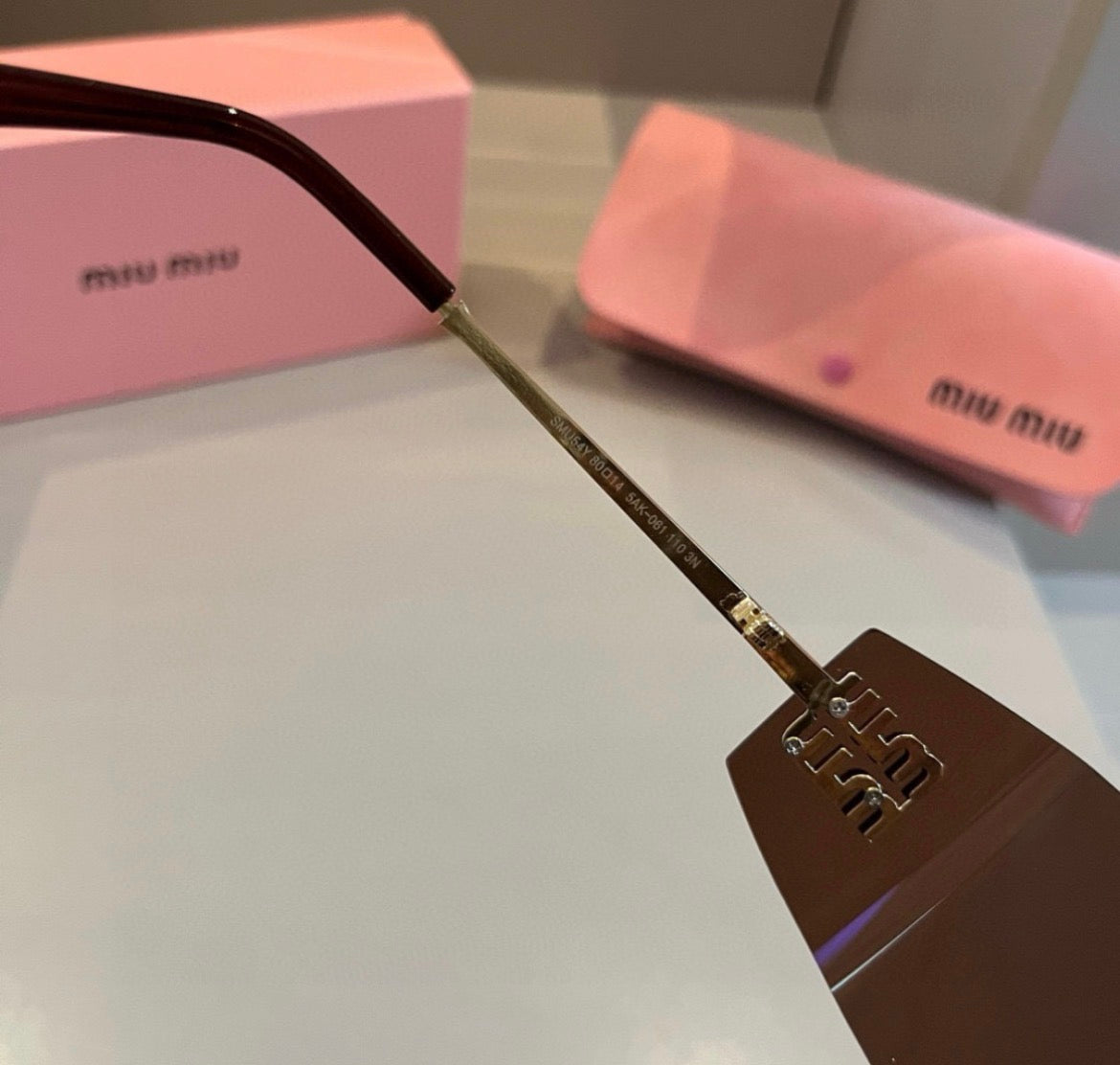 Miu Miu SMUA54 Brown Rimless Oval Sunglasses