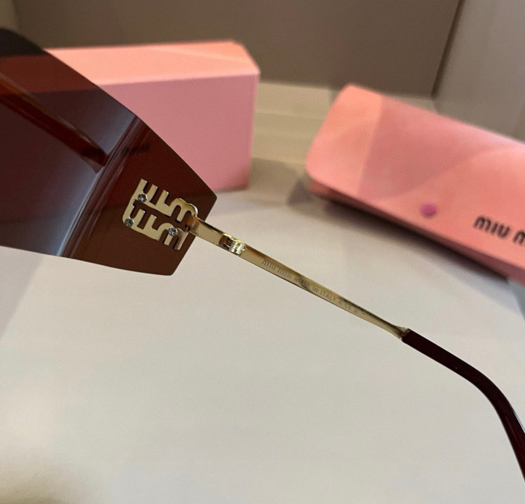 Miu Miu SMUA54 Brown Rimless Oval Sunglasses