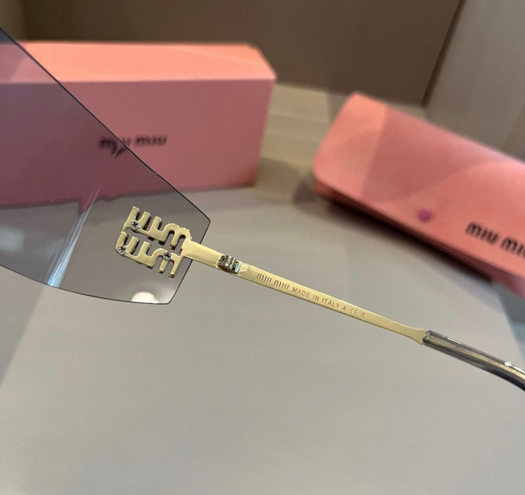Miu Miu SMUA54 Clear Rimless Oval Sunglasses