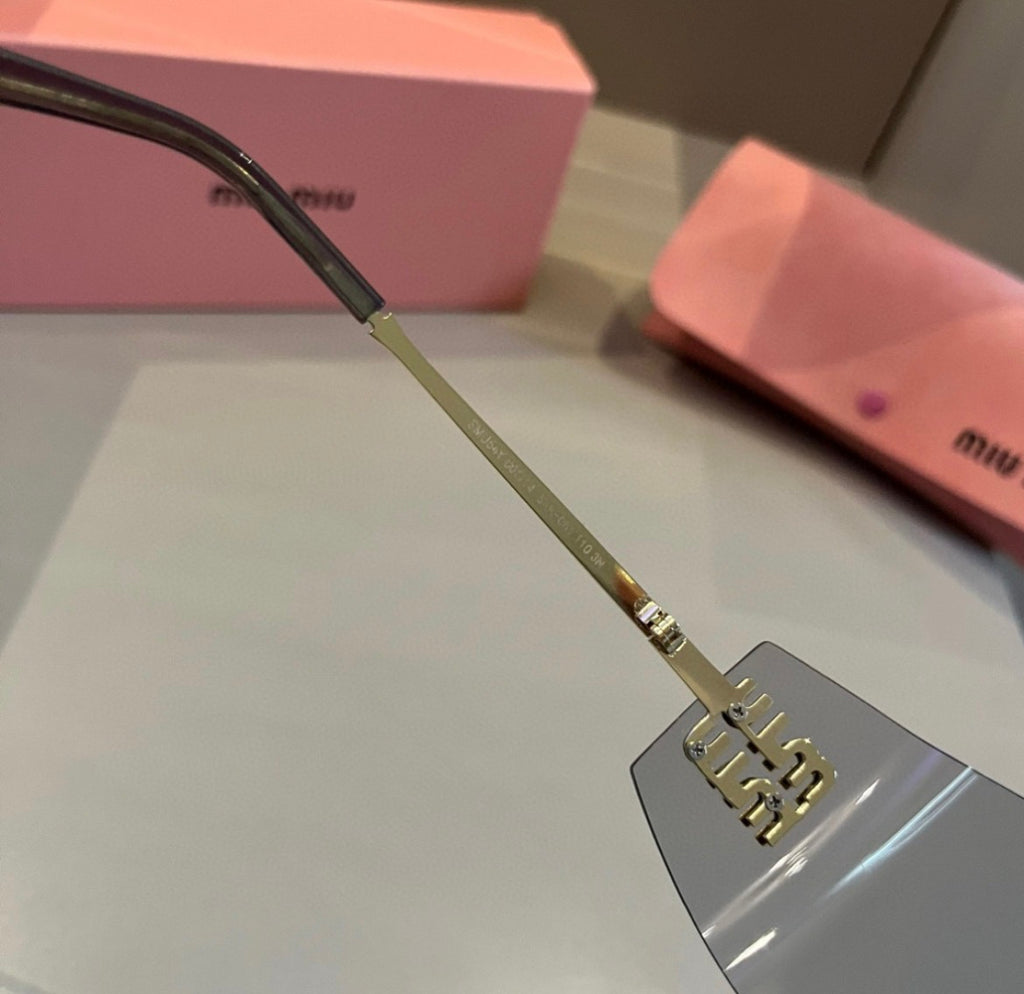 Miu Miu SMUA54 Clear Rimless Oval Sunglasses