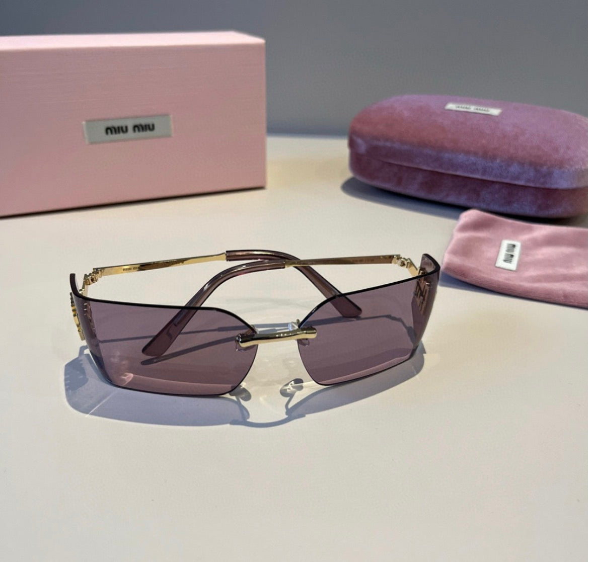 Miu Miu SMUA54 Lavender Rimless Oval Sunglasses
