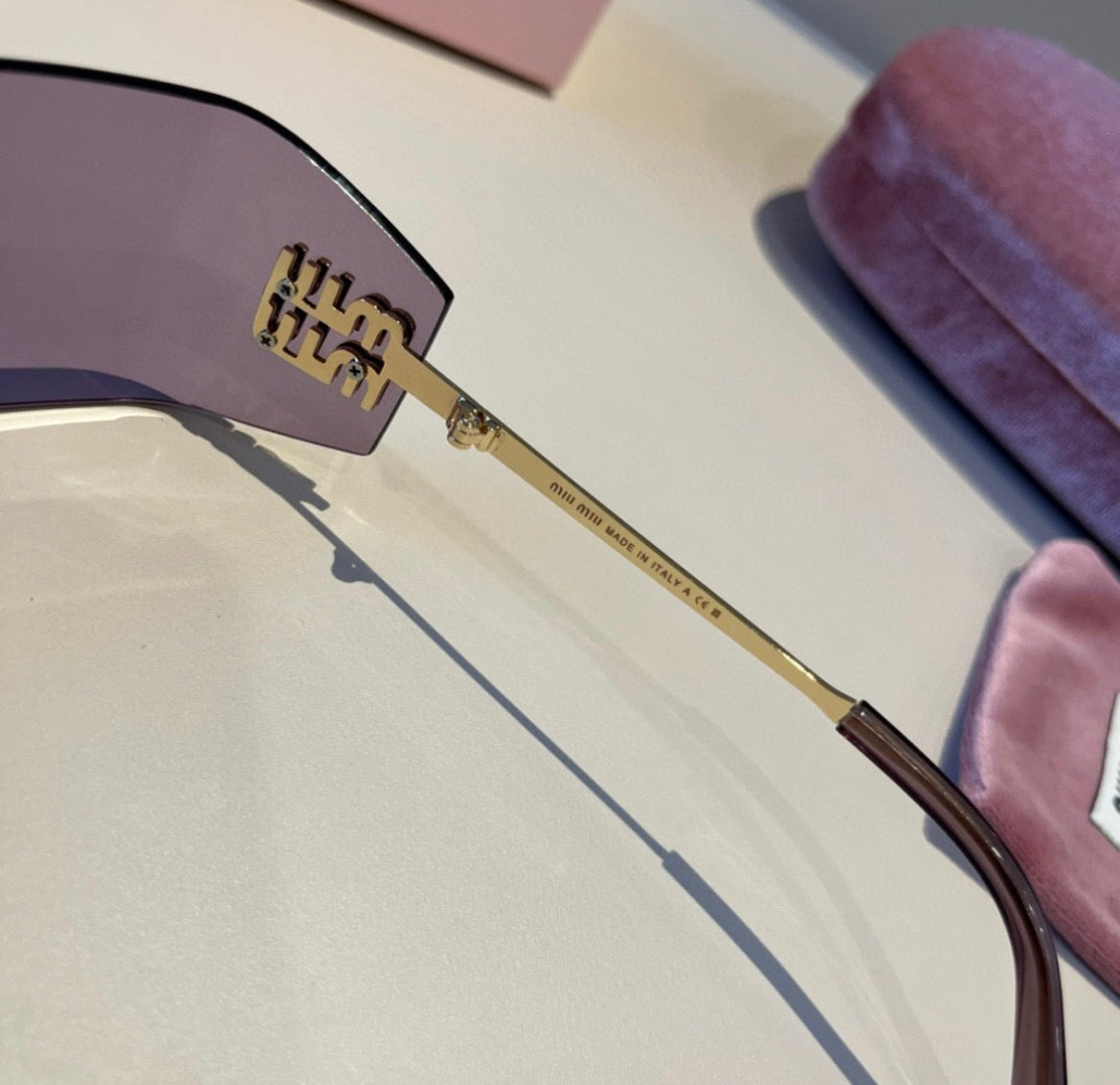 Miu Miu SMUA54 Lavender Rimless Oval Sunglasses