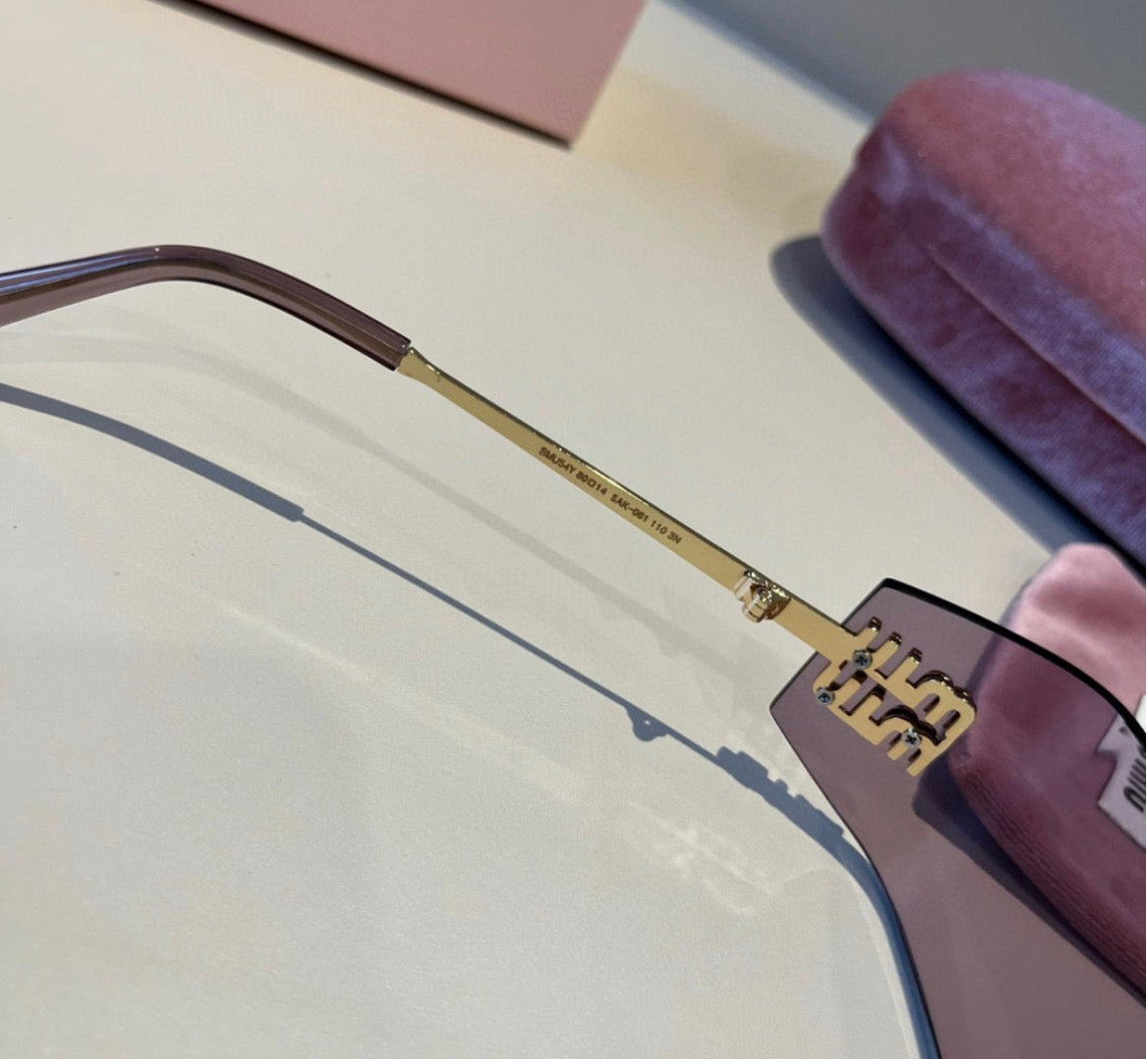 Miu Miu SMUA54 Lavender Rimless Oval Sunglasses